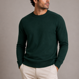 Men’s crew neck fine knit sweater by Zexov, shown in a close-up of the soft, textured fabric and classic design.