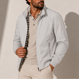 Men's Zexov bomber jacket with stand collar, lightweight casual zip-up design, shown in black with front pockets.