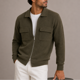 Men’s zip-up knit jacket by Zexov featuring a collar and chest pockets, styled as a casual men's cardigan.
