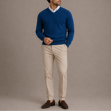 Men’s Zexov V-neck sweater, classic knit long sleeve pullover in neutral color, displayed on a hanger against a plain background.