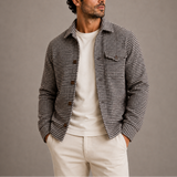 Men’s Houndstooth shirt jacket by Zexov, featuring a classic black and white houndstooth pattern, button-up front, and collar.