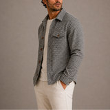 Men’s houndstooth shirt jacket by Zexov, featuring a classic black and white checkered pattern and button-up front.