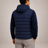 Men's lightweight puffer jacket with hood by Zexov, featuring a sleek design and quilted insulation for everyday comfort.