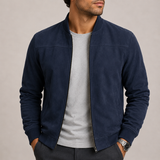 Men’s suede bomber jacket by Zexov featuring a lightweight design, classic fit, and stylish everyday appeal, shown in a natural pose.