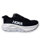 Women's Hoka Gaviota 6 wide running shoes in black and white with supportive design and cushioned soles.