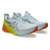 Men's ASICS GEL-Kayano 32 stability trainers in sky lemon color with supportive design and cushioned sole.