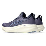 Men's ASICS GEL-Nimbus 27 wide neutral daily trainers in Indigo Fog and Denim Blue with supportive cushioning.