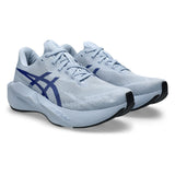 Men's ASICS Novablast 6 Wide neutral daily trainers in solid Prussian Blue with breathable mesh upper and cushioned sole.