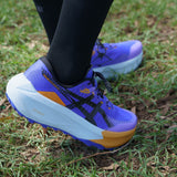 Men's ASICS Trabuco Max 5 trail running shoes in cobalt burst and black with rugged outsole and breathable mesh upper.