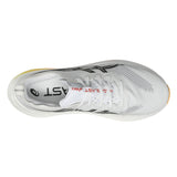 Unisex ASICS Megablast tempo trainers in white and orange glow with breathable mesh and cushioned sole.