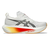 Unisex ASICS Megablast tempo trainers in white and orange glow with breathable mesh upper and cushioned sole.