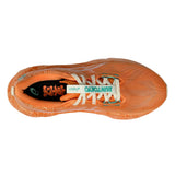 Unisex ASICS Novablast 5 Tokyo neutral daily trainers in sun peach and white with breathable mesh upper.