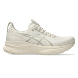Women's ASICS GEL-Kayano 32 stability trainers in oatmeal and meteor grey, featuring supportive design and cushioned soles.