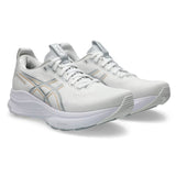 Women's ASICS GEL-Kayano 32 stability trainers in white and champagne with supportive cushioning and sleek design.