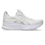 Women’s ASICS GEL-Kayano 32 stability trainers in white and champagne with supportive design and cushioned soles.