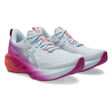Women's ASICS Novablast 5 neutral daily trainers in sky digital and sakura colorway, featuring lightweight, cushioned running shoes.
