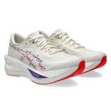 Women’s ASICS Sonicblast Tokyo tempo trainers in cream and blue fade with breathable mesh and supportive sole.