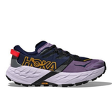 Womens Hoka Speedgoat 7 wide trail running shoes in berry jam, starlight glow color, with supportive D-width fit and durable outsole.