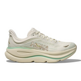 Women's Hoka Bondi 9 shoes in Truffle Salt Sea Glass with B-width, featuring a sleek design and supportive running sole.