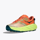 Women’s Hoka Speedgoat 7 shoes in persimmon neon yuzu color, featuring a B-width athletic trail design and durable running sole.