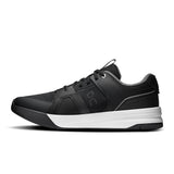 On THE ROGER Clubhouse Pro 2 men's tennis shoes in white and blue with cushioned soles and breathable mesh uppers.