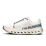 Men's On Cloudsurfer Next road running shoes in black and blue with cushioned sole and breathable upper for comfort.
