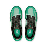Men's On Cloudsurfer Next road running shoes in black and gray with cushioned soles and breathable mesh uppers.