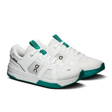 On THE ROGER Clubhouse Pro 2 men's tennis shoes with white and blue design, featuring cushioned sole and breathable upper.