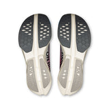 Women's On Cloudboom Strike road running shoes in black and pink with breathable mesh upper and cushioned sole.