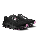 Men's On Cloudmonster 3 road running shoes in limited edition black and eclipse colorway, featuring breathable mesh and cushioned soles.