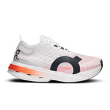 Women's On Cloudboom Strike road running shoes with lightweight design and responsive cushioning, shown in a sleek athletic style.