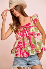 BiBi floral print woven bow tie ruffle square neck top by Trendsi, featuring colorful floral pattern and feminine ruffle details.