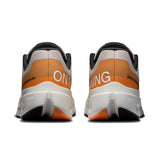Men's On Cloudsurfer Next road running shoes in gray with white accents, featuring cushioned soles and breathable mesh uppers.