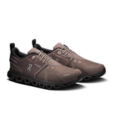 Women's On Cloud 6 Waterproof running shoes with cushioned soles and breathable upper, designed for active outdoor wear.