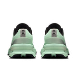 On Cloudpulse Pro women's training shoes in black with white accents, featuring breathable mesh uppers and cushioned soles for support.