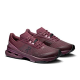 On Cloudpulse Pro women's training shoes in black with white accents, showing the lightweight design and cushioned sole.