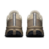 Women's On Cloudrock Low Waterproof hiking shoes with black and gray design, featuring durable outdoor footwear for hiking adventures.