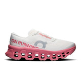 Women's On Cloudmonster 3 road running shoes in black and white with cushioned soles and breathable mesh upper.