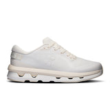 On Cloudzone women's active life shoes in black and white, featuring cushioned soles and breathable upper fabric.