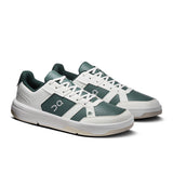 Men's On THE ROGER Clubhouse tennis shoes in black and white, featuring lightweight design and cushioned outsole for comfort.