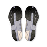 Women's On Cloudsurfer Next road running shoes with breathable mesh upper, cushioned sole, and sporty design.