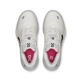 On THE ROGER Pro 3 women's tennis shoes in white with black accents, featuring a sleek design and cushioned sole.