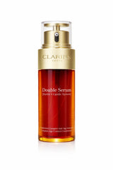 Clarins Double Serum Complete Age Control anti-aging face serum in a 75ml bottle, designed to improve skin firmness and radiance.