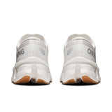 Women's On Cloudmonster 3 FP Movement road running shoes with breathable mesh and cushioned sole for comfort.