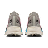 Women's On Cloudboom Strike road running shoes with lightweight design and responsive cushioning, shown in a sleek black and white colorway.