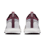 On Cloud 6 Versa men's active life running shoes with lightweight design and cushioned soles, in a sleek black and white color.