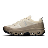 Women's On Cloudrock Low Waterproof hiking shoes with black and gray design, featuring durable waterproof material and rugged sole.