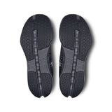 On Cloudsurfer Next women's road running shoes with breathable mesh and cushioned soles, designed for comfort and performance.