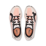 Women's On Cloudboom Volt road running shoes with black and white design, featuring lightweight cushioning and breathable mesh.