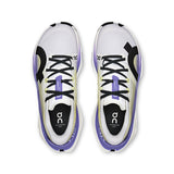 Women’s On Cloudboom Max road running shoes with black and white design, featuring cushioned soles and breathable mesh upper.